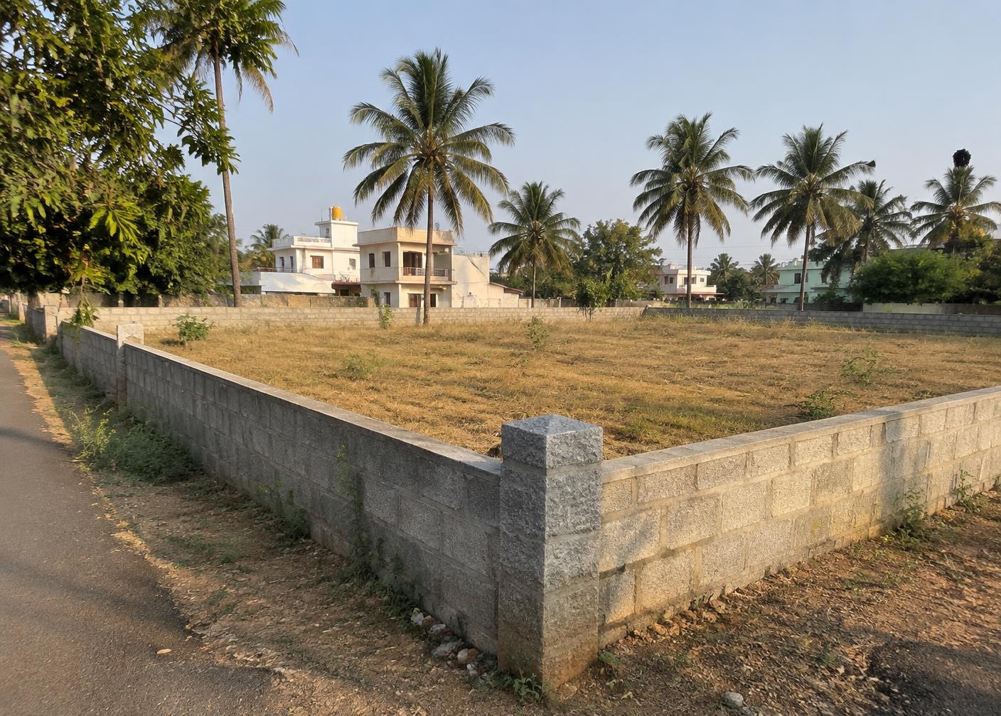 A walled and secured open land plot on a quiet street